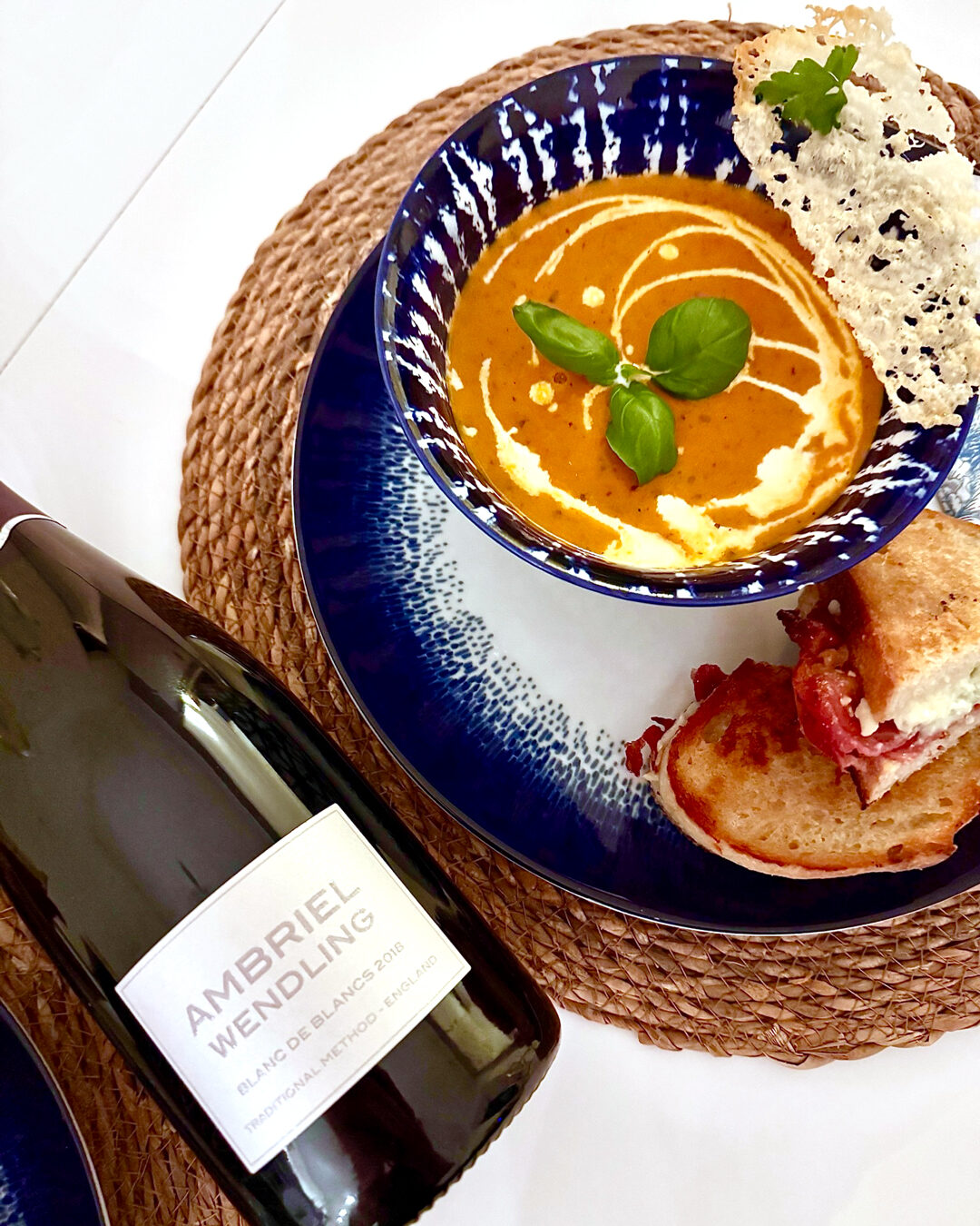 Ambriel Wendling Blanc de Blancs 2018 beside homemade tomato soup and grilled cheese.