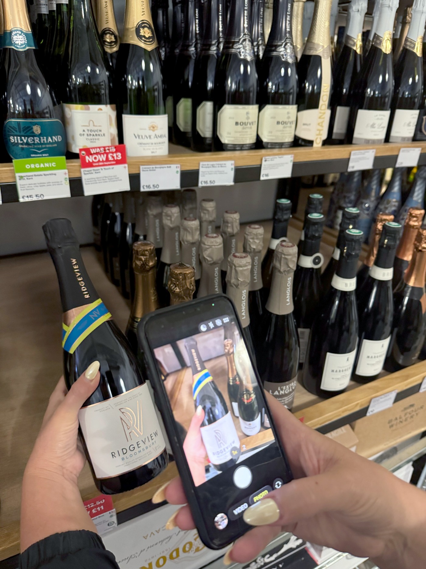 Photographing a Ridgeview bottle on a wine shop shelf