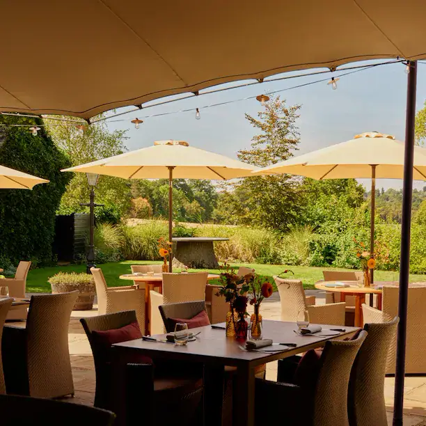 The terrace at The Barn restaurant at Coworth Park